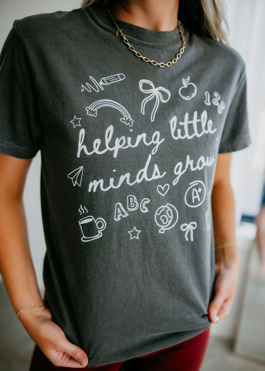 Helping Little Minds Grow Graphic Tee
