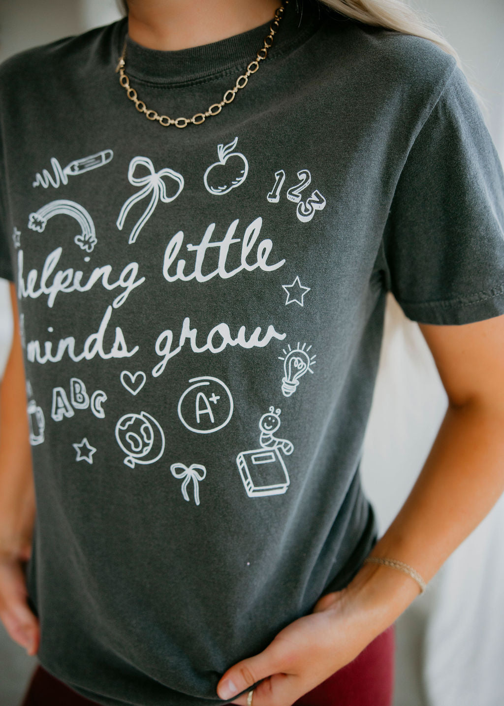 Helping Little Minds Grow Graphic Tee