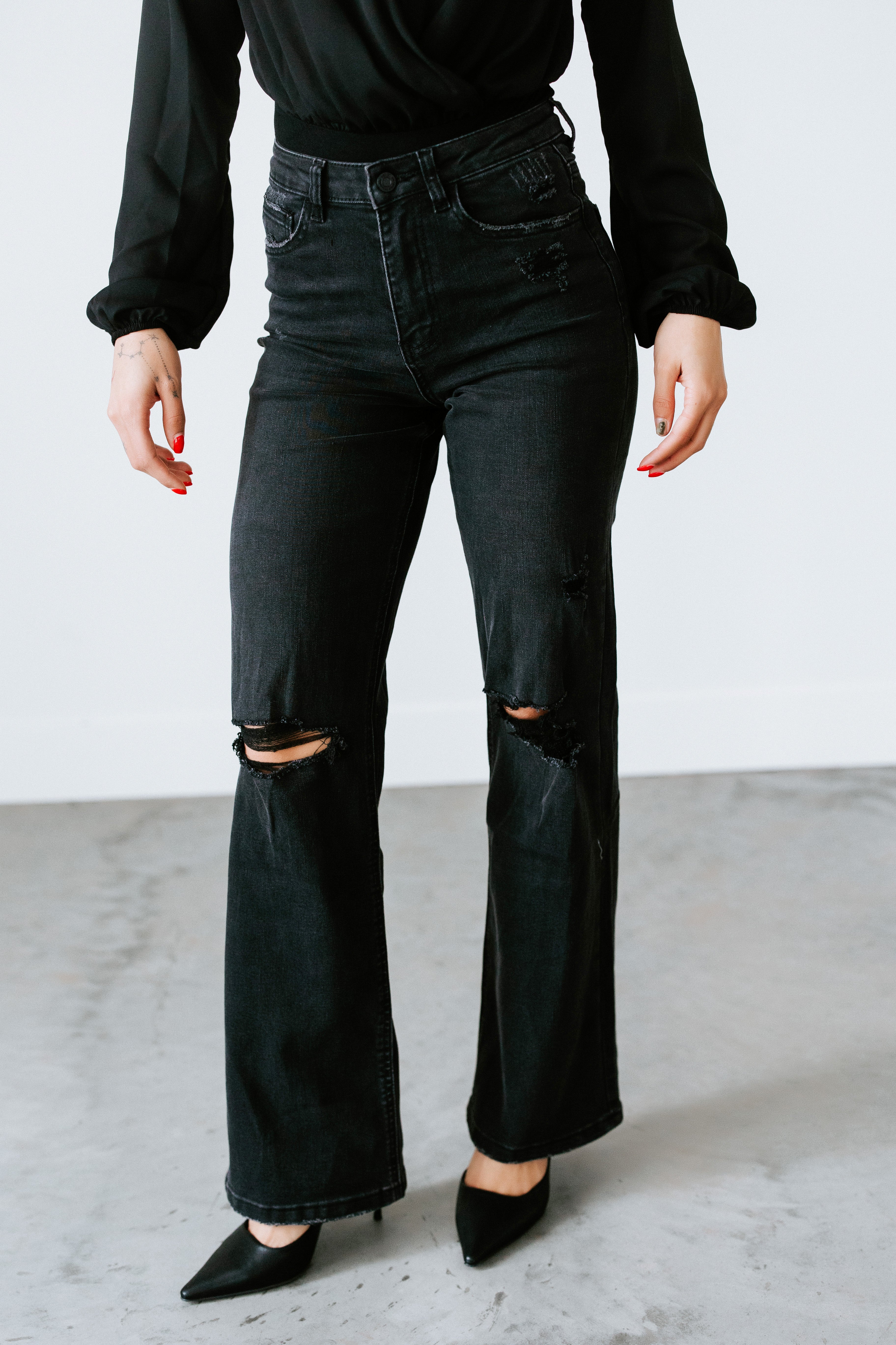 image of Flora Distressed Flare Jean