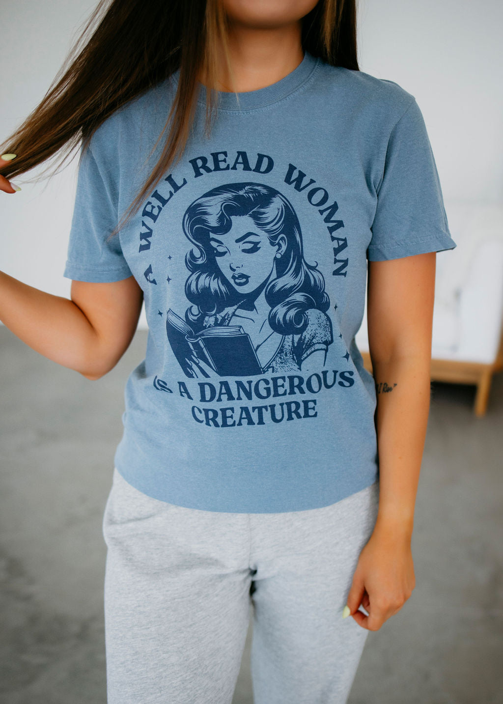 A Well Read Woman Graphic Tee