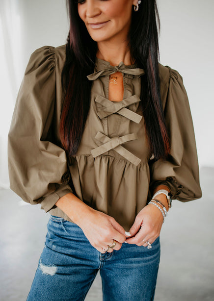 Vega Bow Peplum Top