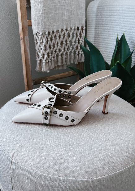 Compelling Heeled Mules