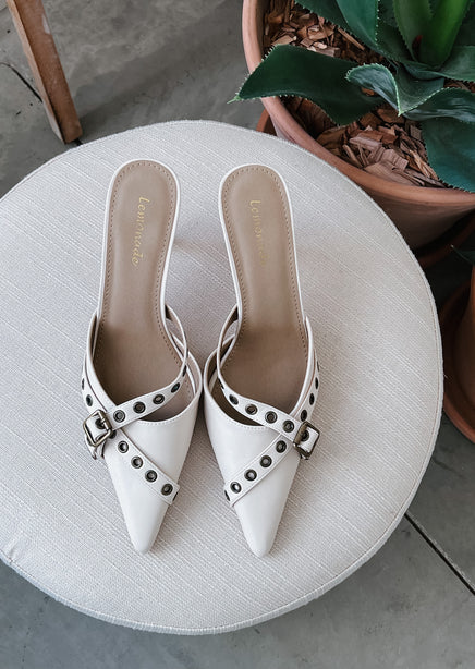 Compelling Heeled Mules