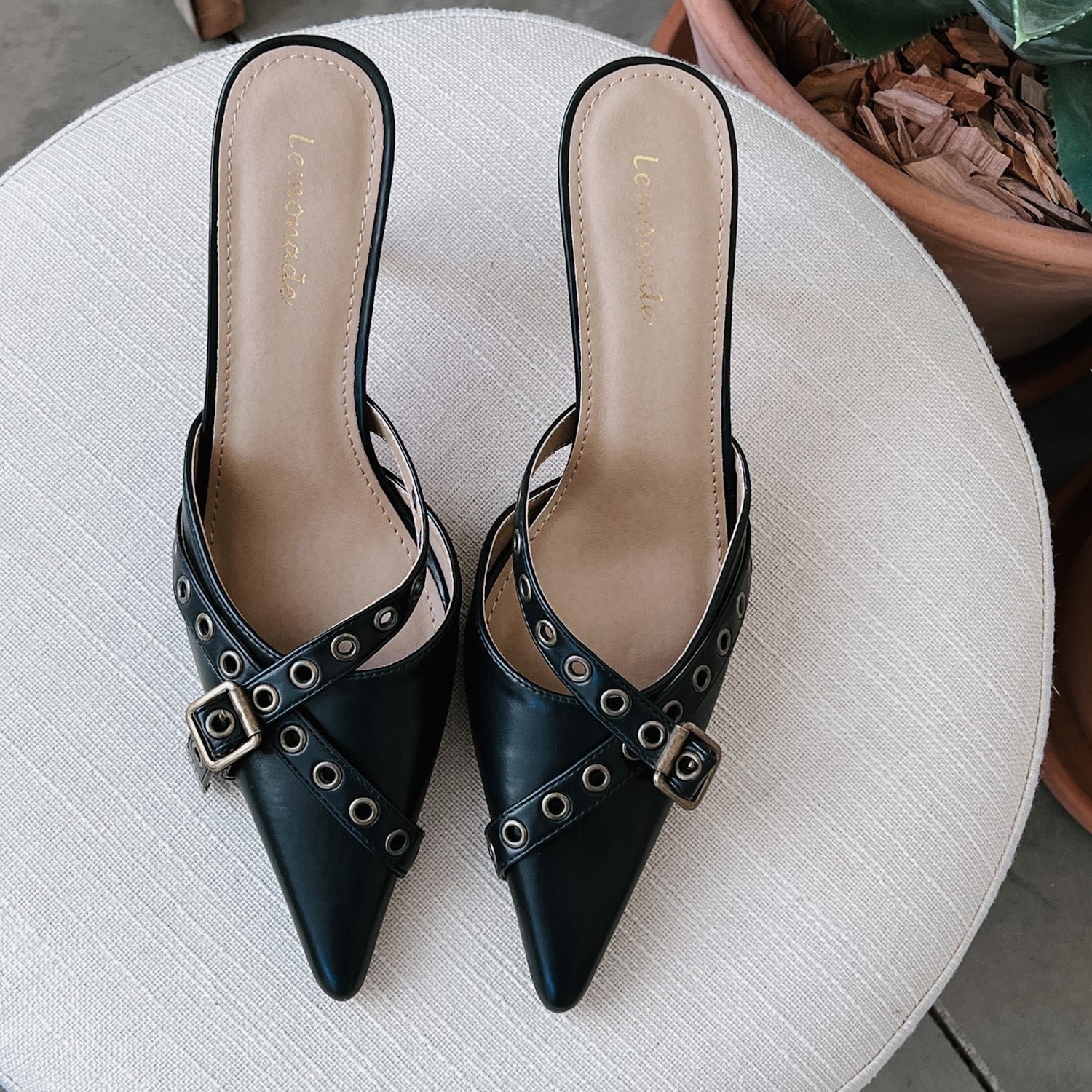 Compelling Heeled Mules