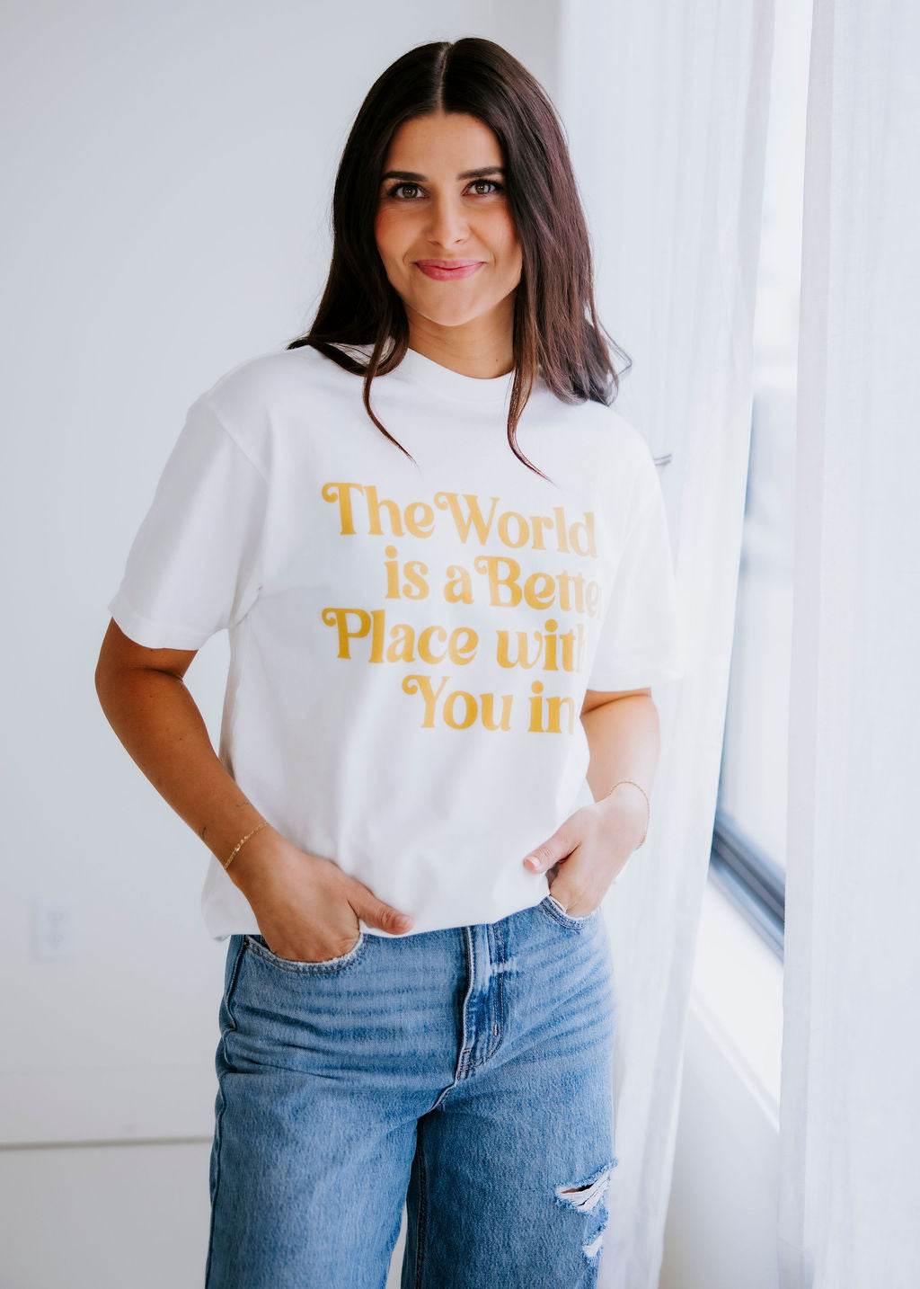 The World Is A Better Place Graphic Tee
