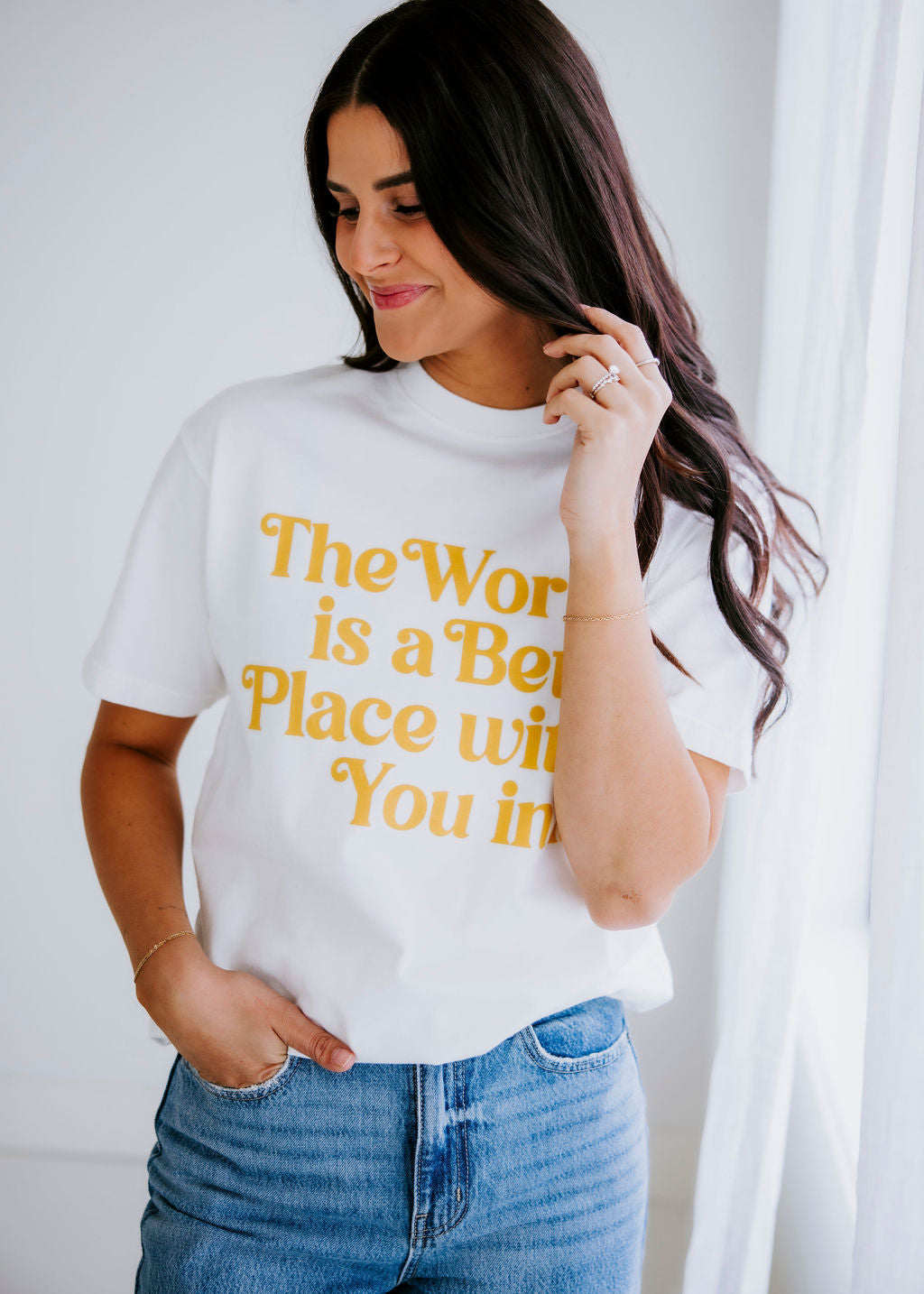 image of The World Is A Better Place Graphic Tee