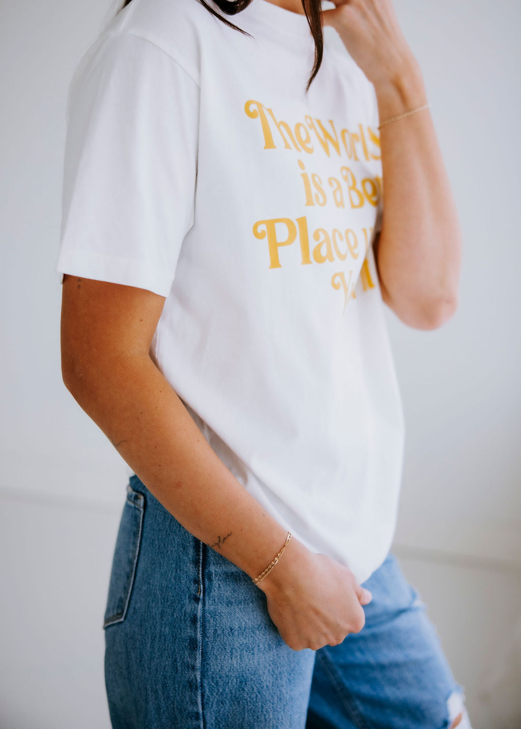 The World Is A Better Place Graphic Tee