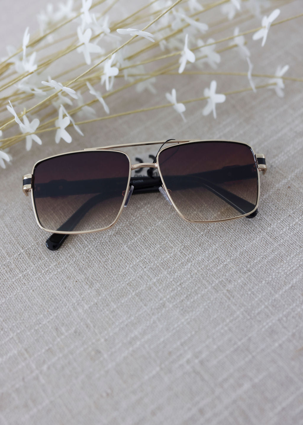 image of West Striped Aviator Sunglasses
